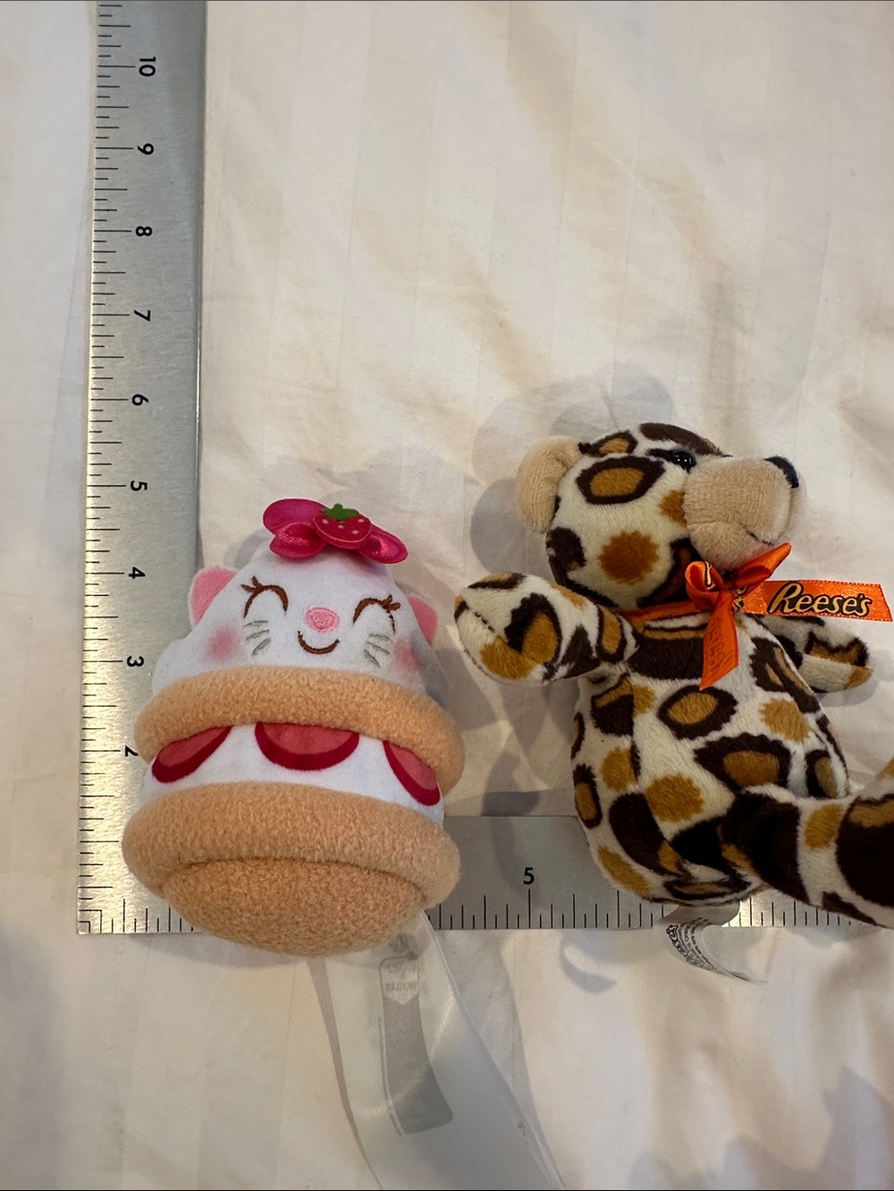 Disney strawberry shortcake, stuffed plushy and Reese’s pieces leopard plushy - Picture 9 of 9
